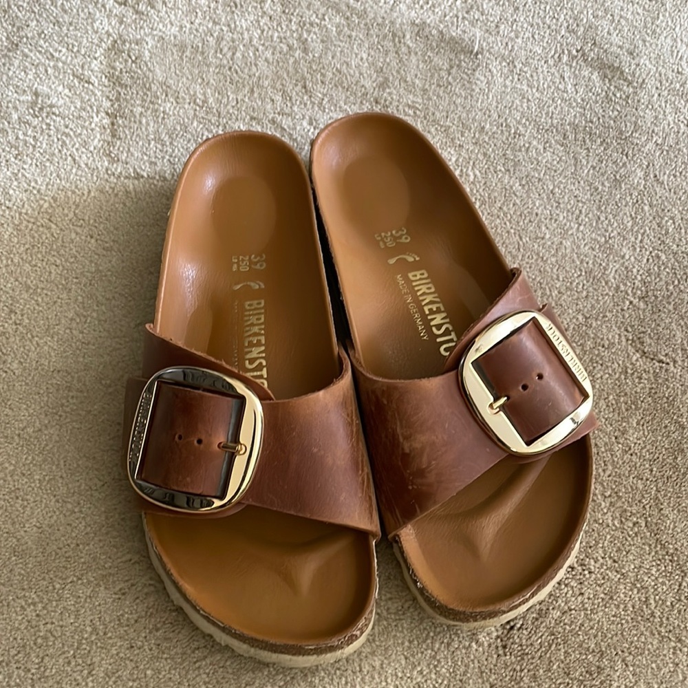 Birkenstock - single strap big buckle size 39. Lightly worn.